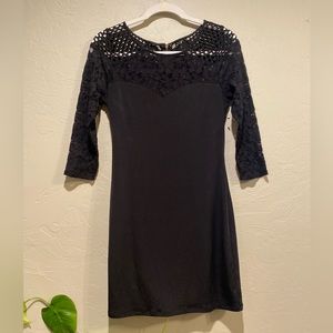 Express size small black mini dress with lace and netting detail